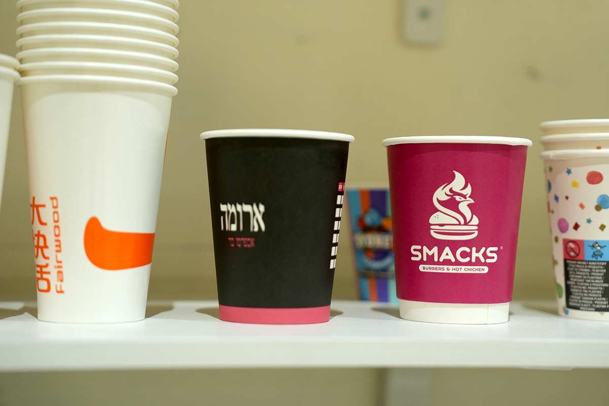 assorted branded takeaway paper cups
