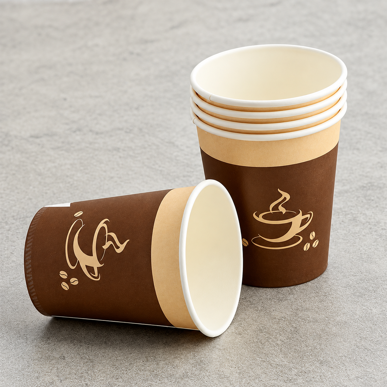Brown printed paper cups arranged for practical seam and leak resistance review