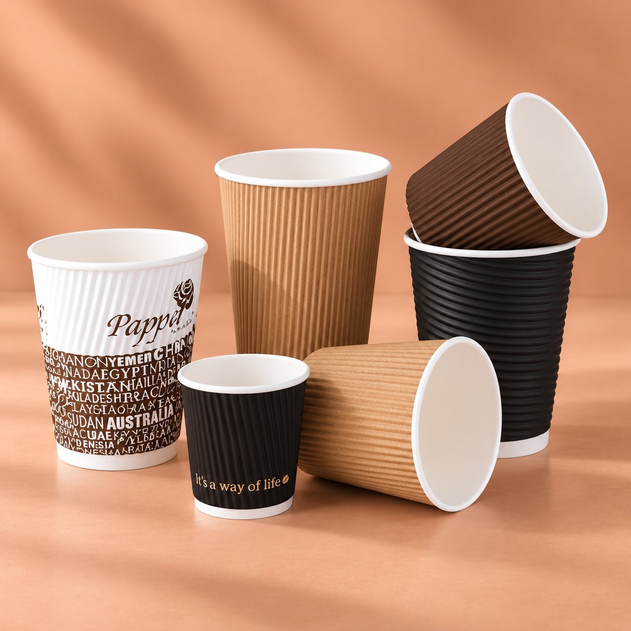 Corrugated ripple-wall paper cups showing thicker board construction used for hot drinks.