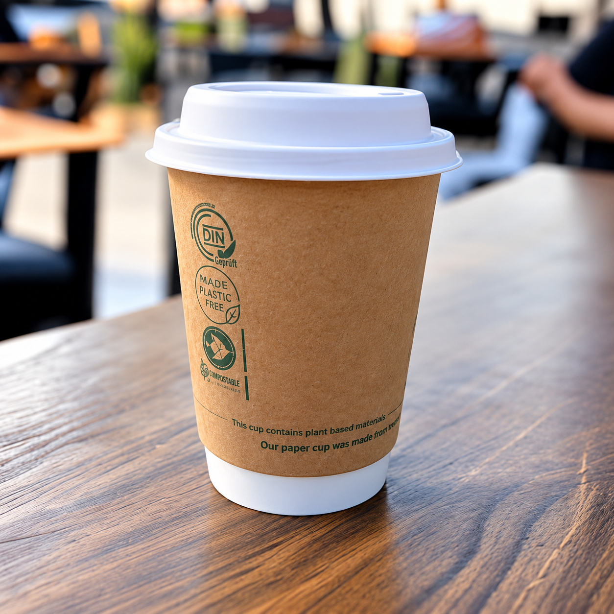 Kraft paper cup with made plastic free and compostable claim markings