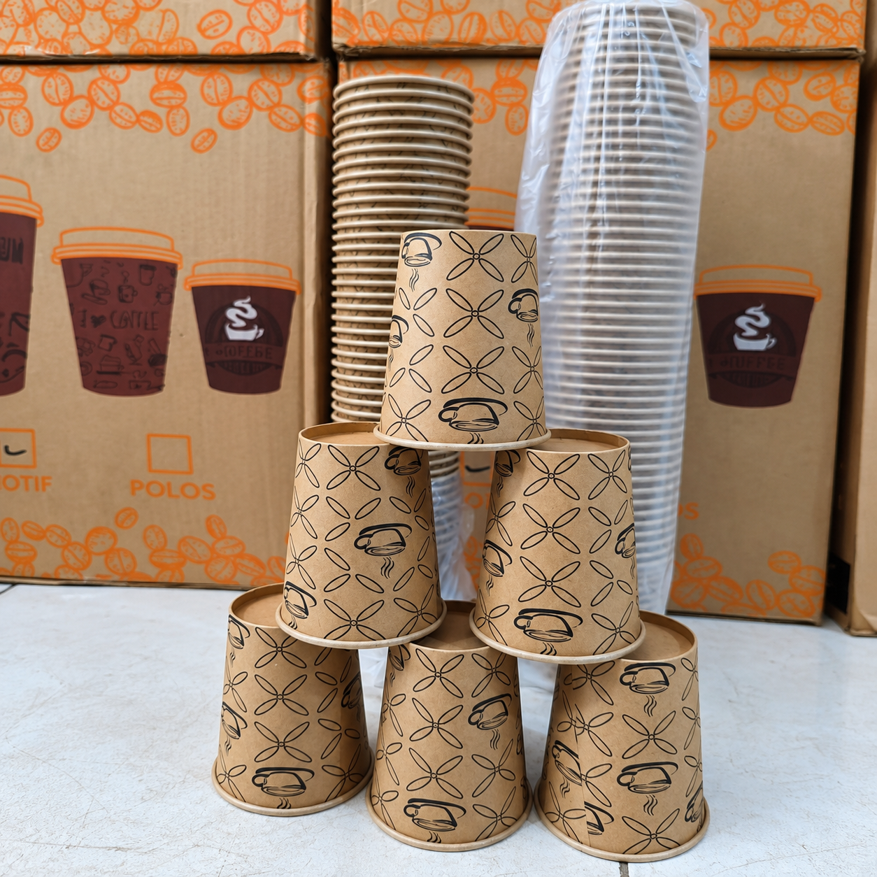 Printed kraft paper cups and packaging showing SKU-specific cup configuration