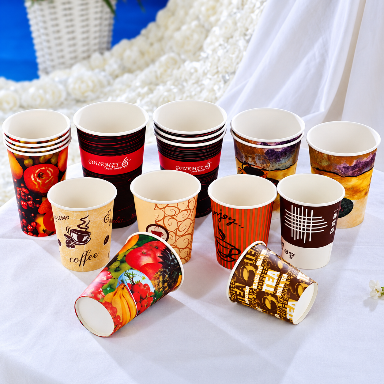 Range of printed paper cups for buyer compliance documentation checks across cup designs