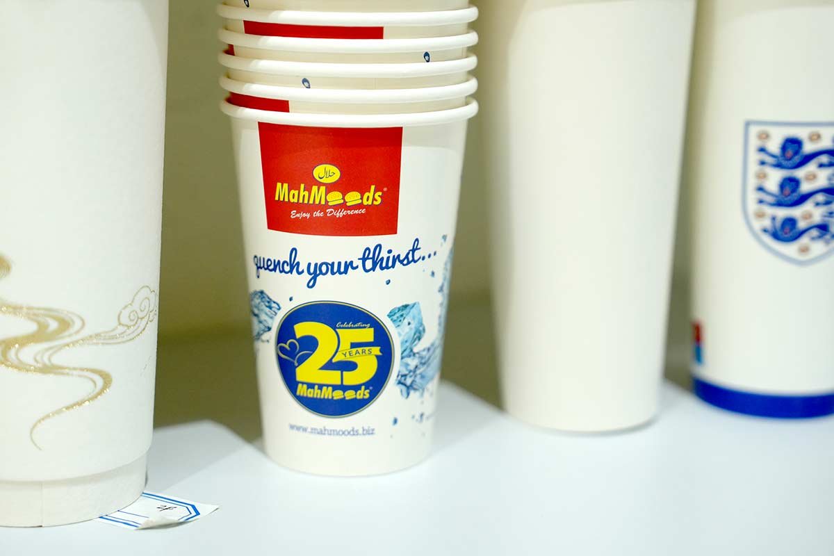 white branded paper cup stack