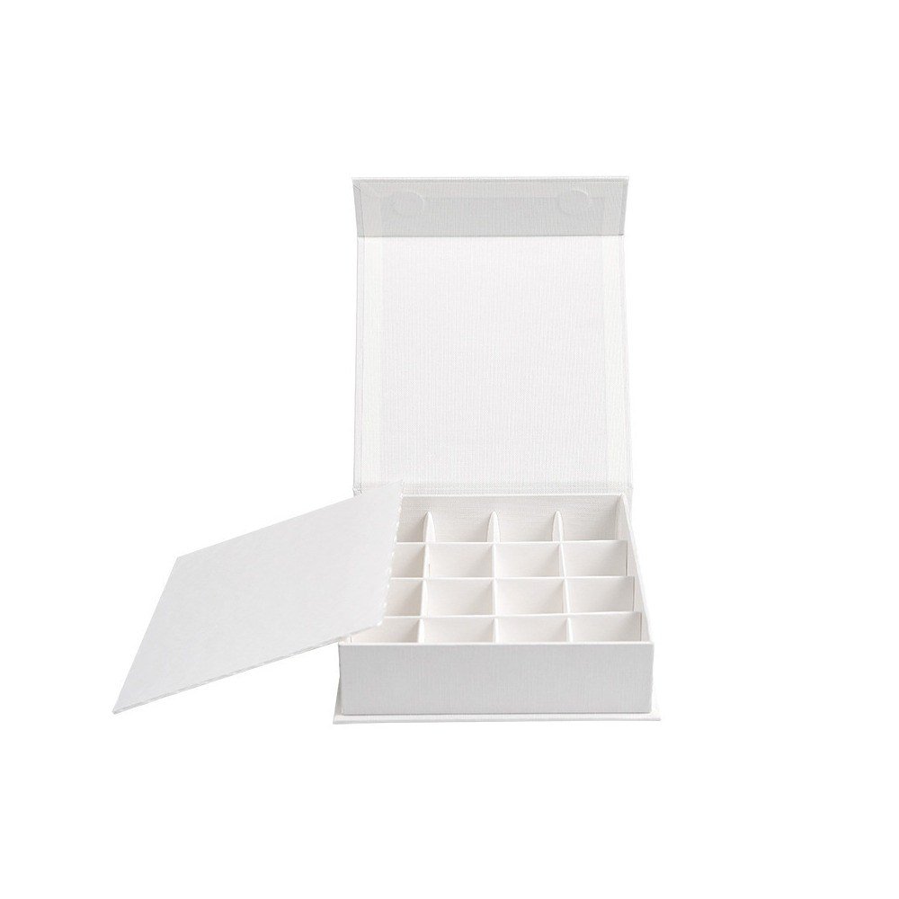 Book style chocolate box open showing white compartment dividers